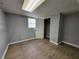 Finished basement with laminate flooring, closet, and window at 3796 Leesburg Sw Ct, Atlanta, GA 30331