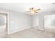 Large, well-lit bedroom with plush carpeting and a mirrored closet for abundant storage space at 1194 Grandview Cir, Powder Springs, GA 30127
