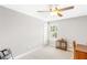 Simple bedroom with neutral walls, large window, and hardwood desk at 1194 Grandview Cir, Powder Springs, GA 30127