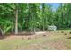 Backyard with a wooded area and storage shed at 1284 Brandl Dr., Marietta, GA 30008