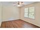 Bright bedroom featuring a ceiling fan, wood-look flooring and natural light from the double window at 1284 Brandl Dr., Marietta, GA 30008