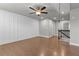 Upstairs bonus room with hardwood flooring and board and batten walls; perfect for a den or office at 1640 Tide Mill Rd, Cumming, GA 30040