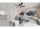 Spacious living room featuring a large sectional sofa, modern decor, and neutral tones at 1640 Tide Mill Rd, Cumming, GA 30040