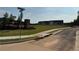 Landscaped entrance to Klondike Reserve featuring lush green lawns and decorative brickwork at 218 Seward St # 92, Conyers, GA 30094