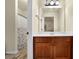 Bright bathroom featuring a spacious vanity with a view into another room at 4581 Sagebrush Ct, Snellville, GA 30039