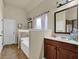 Bright bathroom features a soaking tub and vanity with ample counter space at 4581 Sagebrush Ct, Snellville, GA 30039
