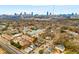 Picturesque aerial view of neighborhood with the city skyline in the background at 212 Haralson Ne Ave, Atlanta, GA 30307