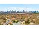 Breathtaking aerial view of a suburban neighborhood with the Atlanta skyline in the distance at 212 Haralson Ne Ave, Atlanta, GA 30307