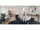 Comfortable living area with elegant decor, and an open floor plan leading to the kitchen at 212 Haralson Ne Ave, Atlanta, GA 30307