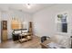 Bright office with a desk, a loveseat, and lots of natural light at 212 Haralson Ne Ave, Atlanta, GA 30307