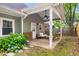 Cozy covered patio with outdoor seating and a view of the backyard at 212 Haralson Ne Ave, Atlanta, GA 30307