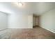 This bedroom offers carpeted floors and two doors to other areas of the home at 297 Edison Dr, Stockbridge, GA 30281