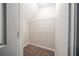 Walk-in closet with carpeting and single shelf with hanging bar at 297 Edison Dr, Stockbridge, GA 30281