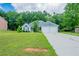 Charming single-story home with a well-maintained front lawn and a two-car garage at 297 Edison Dr, Stockbridge, GA 30281