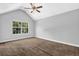 Bedroom with vaulted ceiling and a window providing natural light at 3534 Oakshire Se Way, Atlanta, GA 30354