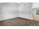 Inviting Living Room with neutral carpet and classic wainscoting at 3534 Oakshire Se Way, Atlanta, GA 30354