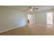 Bedroom featuring neutral walls, carpet flooring, and access to an ensuite bathroom with modern finishes at 3661 Boring Rd, Decatur, GA 30034