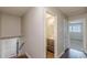 Upstairs hallway with bathroom and bedroom access plus staircase to the first floor at 3661 Boring Rd, Decatur, GA 30034
