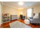Bedroom features a desk, hardwood flooring, large window, and a closet at 3677 Blackshear Ct, Duluth, GA 30096