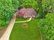 Private home features a meticulously maintained lawn, mature trees, and beautiful landscaping at 1275 Fontainebleau Ct, Lawrenceville, GA 30043