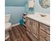 Bathroom includes a toilet, sink, and vanity with ample storage space, offering a practical area at 1275 Fontainebleau Ct, Lawrenceville, GA 30043
