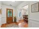 Inviting foyer features gleaming wood floors and charming details setting the tone for the rest of the home at 1275 Fontainebleau Ct, Lawrenceville, GA 30043