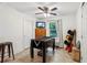 Bright game room with a foosball table, television, and quirky decor at 1275 Fontainebleau Ct, Lawrenceville, GA 30043