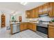 Functional kitchen features stainless steel appliances and an eat-in breakfast area at 1275 Fontainebleau Ct, Lawrenceville, GA 30043