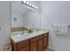 Bright bathroom with double sink vanity, a soaking tub, and neutral tiling for a clean and modern space at 2003 Burns View Ln # 2, Lawrenceville, GA 30044
