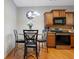 Cozy dining area featuring a round table, stylish chairs, and warm lighting at 2003 Burns View Ln # 2, Lawrenceville, GA 30044