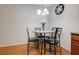 Charming dining area with a round table and four chairs, perfect for intimate meals at 2003 Burns View Ln # 2, Lawrenceville, GA 30044