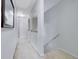 The hallway features arched doorways, neutral walls, and a carpeted floor. The open design offers a modern look at 2003 Burns View Ln # 2, Lawrenceville, GA 30044