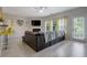 Bright living room with modern flooring, fireplace, and direct access to the outdoors at 2003 Burns View Ln # 2, Lawrenceville, GA 30044