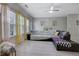 Sun-filled living area showcasing stylish furniture, bright windows, and hardwood floors at 2003 Burns View Ln # 2, Lawrenceville, GA 30044