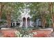 Building entrance with fountain, manicured plants, and grand doorway at 2870 Pharr Court South Nw # 2404, Atlanta, GA 30305