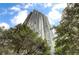 Modern high-rise exterior with ample windows and bright blue sky views at 2870 Pharr Court South Nw # 2404, Atlanta, GA 30305