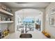 Modern kitchen features stainless steel appliances, open shelving, and a sink overlooking the living room at 2870 Pharr Court South Nw # 2404, Atlanta, GA 30305