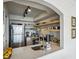 Modern kitchen with stainless steel appliances, white subway tile backsplash, and floating shelves at 2870 Pharr Court South Nw # 2404, Atlanta, GA 30305