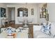 Bright open-concept living space featuring modern decor, light wood flooring, and stainless steel kitchen appliances at 2870 Pharr Court South Nw # 2404, Atlanta, GA 30305