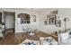 Inviting living room with light wood floors, contemporary decor and stainless steel appliances in the kitchen at 2870 Pharr Court South Nw # 2404, Atlanta, GA 30305