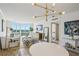 Bright living room featuring an open floor plan, hardwood floors and many windows to let natural light in at 2870 Pharr Court South Nw # 2404, Atlanta, GA 30305