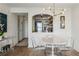 Cozy sitting room showing the modern decor, hard wood flooring, and stainless steel appliances in the kitchen at 2870 Pharr Court South Nw # 2404, Atlanta, GA 30305