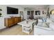 Cozy living room featuring neutral finishes and integrated dining area at 2870 Pharr Court South Nw # 2404, Atlanta, GA 30305