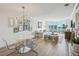 Bright open concept living and dining area with clear city views at 2870 Pharr Court South Nw # 2404, Atlanta, GA 30305