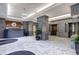 Elegant lobby with marble floors, decorative pillars, and modern lighting at 2870 Pharr Court South Nw # 2404, Atlanta, GA 30305