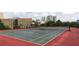 Inviting tennis court with well maintained surface and net in a community with views of nearby buildings and city at 2870 Pharr Court South Nw # 2404, Atlanta, GA 30305
