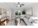 Bright bonus room with comfortable seating, decorative accents, and ample natural light at 333 Gardens Of Harmony Dr, Canton, GA 30115