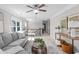 Cozy bonus room with soft seating, neutral tones, and stylish decor creating a wonderful vibe at 333 Gardens Of Harmony Dr, Canton, GA 30115