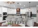 A large kitchen and island provide room for dining at 333 Gardens Of Harmony Dr, Canton, GA 30115