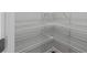A bare walk-in closet with wood floors and metal shelves at 333 Gardens Of Harmony Dr, Canton, GA 30115